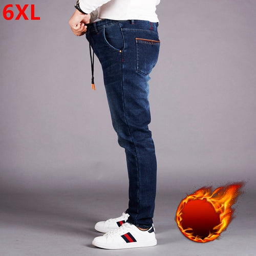 Elastic waist jeans men plus fertilizer XL high waist elastic loose plus velvet feet pants men's trousers trousers winter